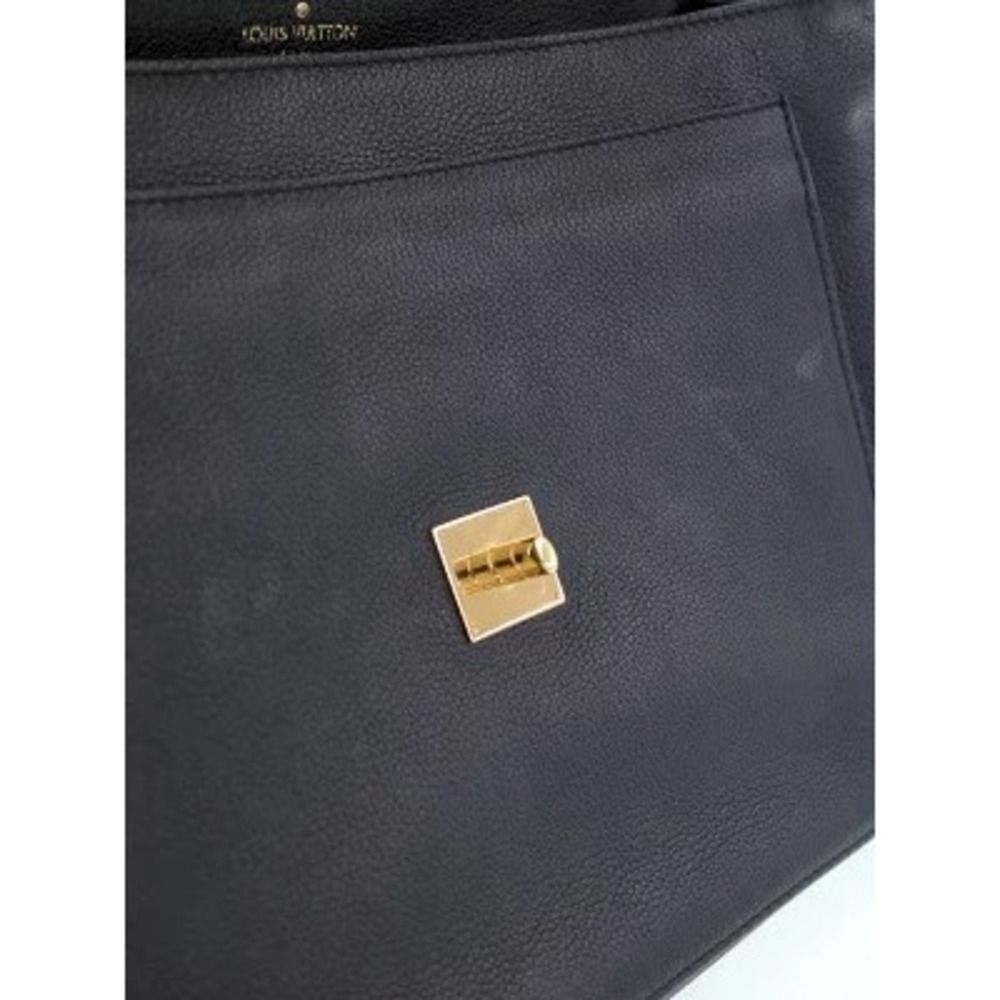 Louis Vuitton Lock Me MM Handbag - Picture 4 of 9